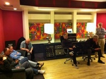 The octet listening to a take from our new recording 